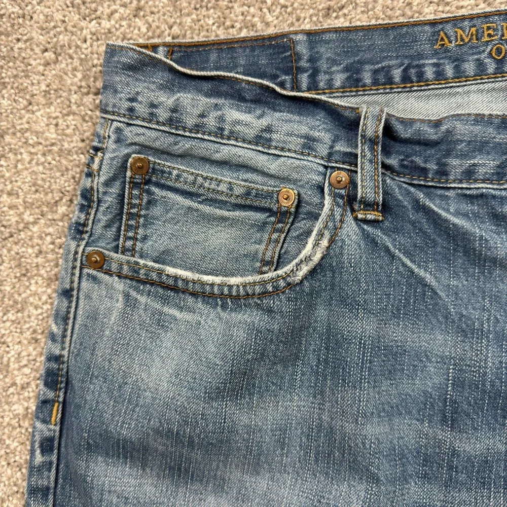American Eagle Original Boot Jeans Mens 36x32 Blue Distressed Faded Bootcut